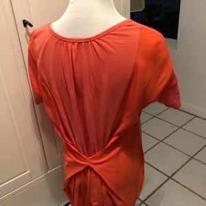 Orange T-shirt with details in back